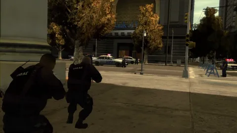 The SWAT team moves in to secure the area in front of the bank.