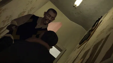 A man threatens Niko with a boxcutter knife.