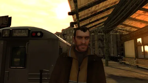Niko walks through a train station.
