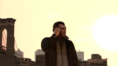 Niko talks on his cell phone.