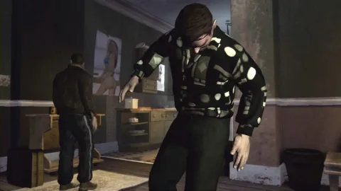 Niko looks around Roman's apartment