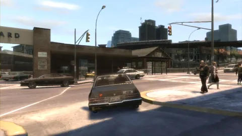 A car pulls out into a bright street