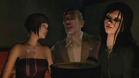 A man surrounded by 2 girls