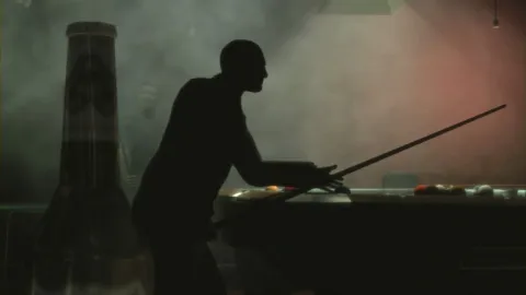 Niko Playing Pool