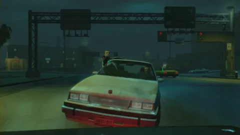 Niko drives while another guy shoots