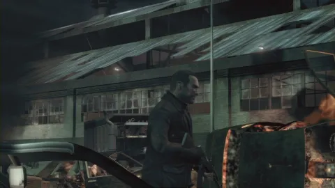 Niko walks past an abandoned warehouse