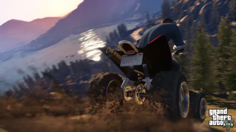 Franklin racing down a mountain on a quad