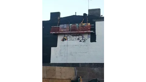 GTA V Cover Art Ad in NYC Being Painted