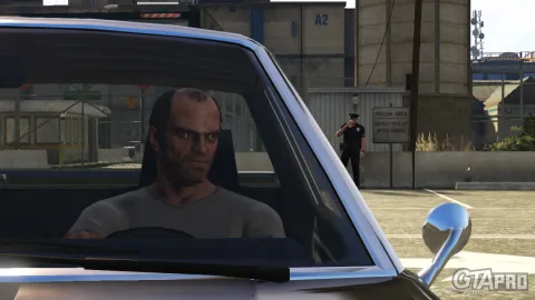 Trevor waits outside the prison