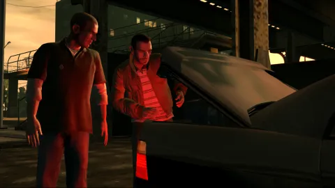 Niko opens the trunk of his car.