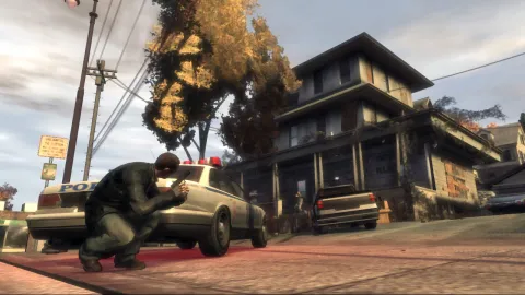 Niko behind police car
