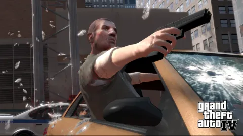 Packie McReary shooting a gun.