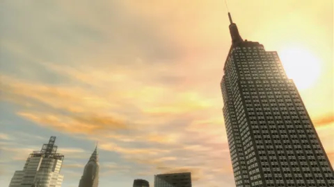 The sun shines past some sky scrapers.