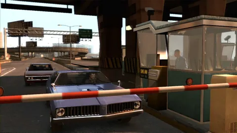 Niko has to pay the toll before he's allowed through.