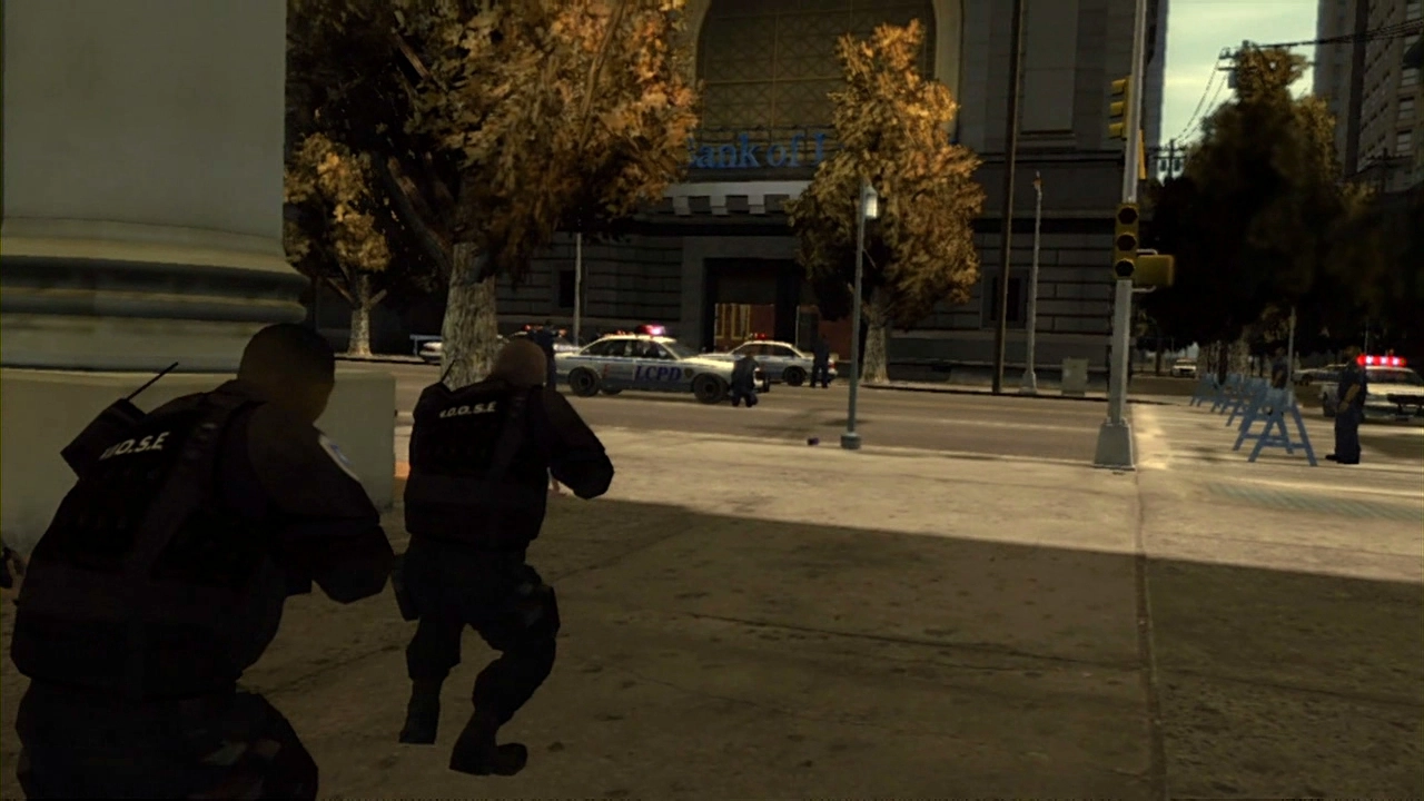 The SWAT team moves in to secure the area in front of the bank.