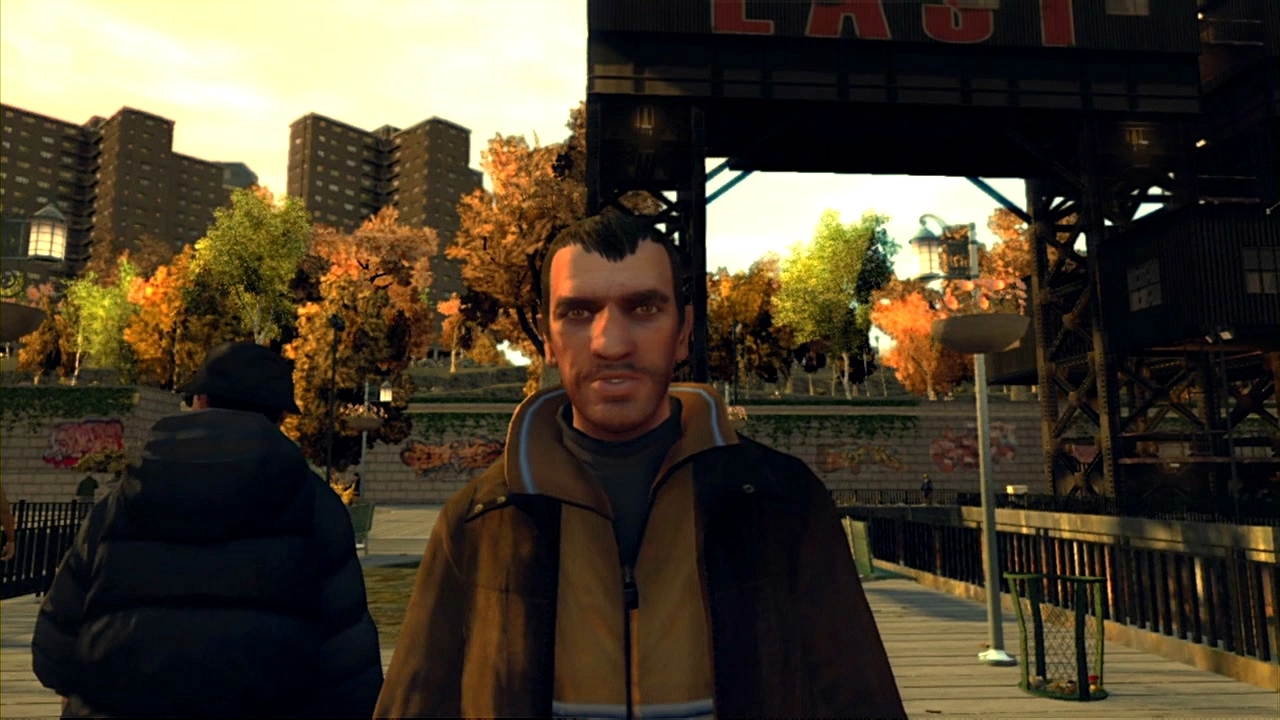 Niko walks through a park.