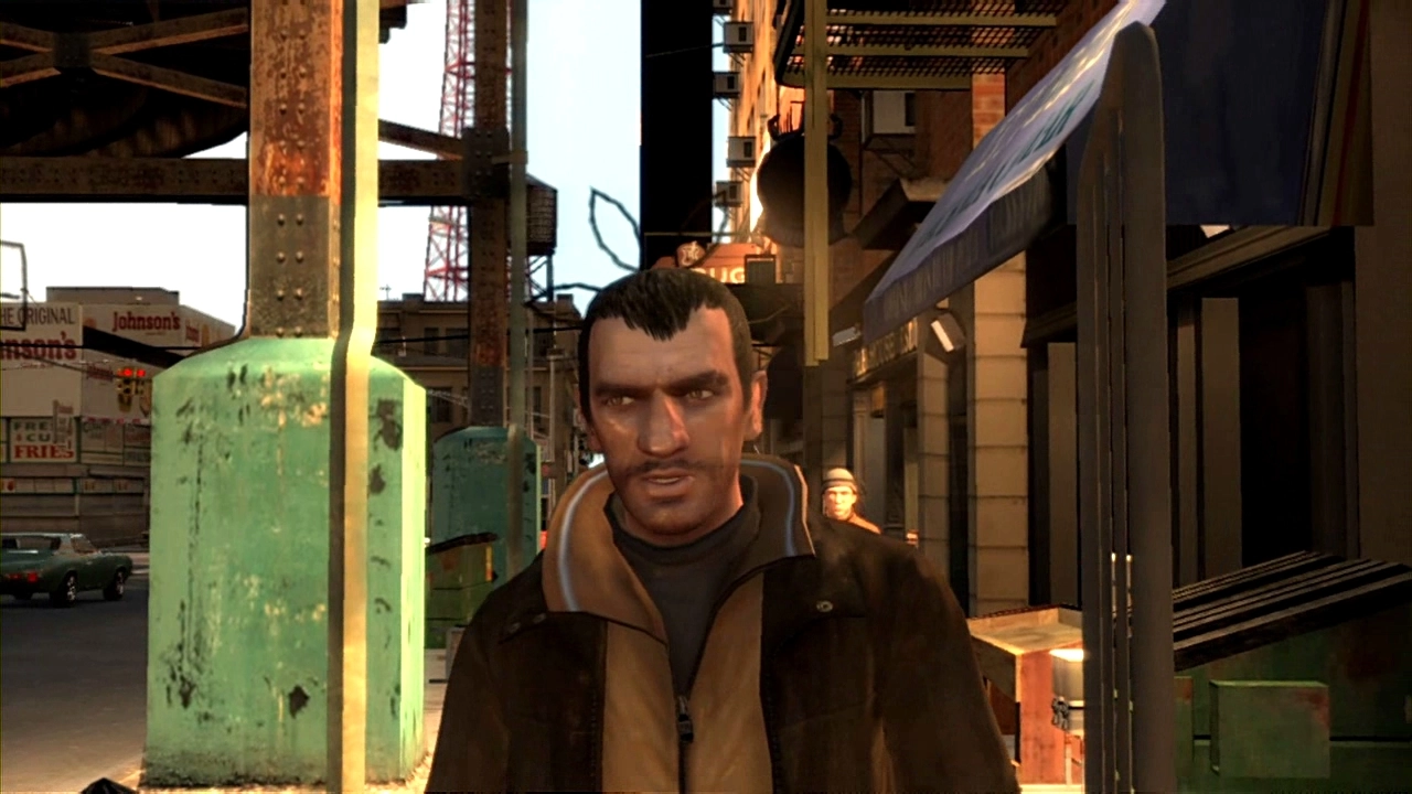 Niko walks along a street.