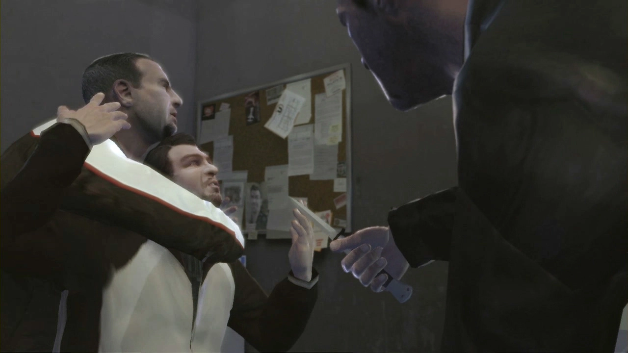 Niko holds a guy a knife point