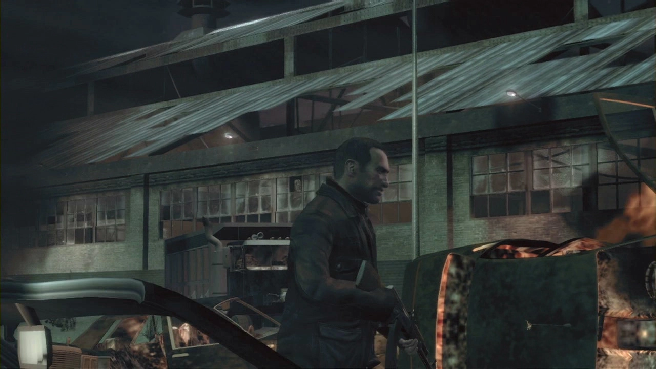 Niko walks past an abandoned warehouse