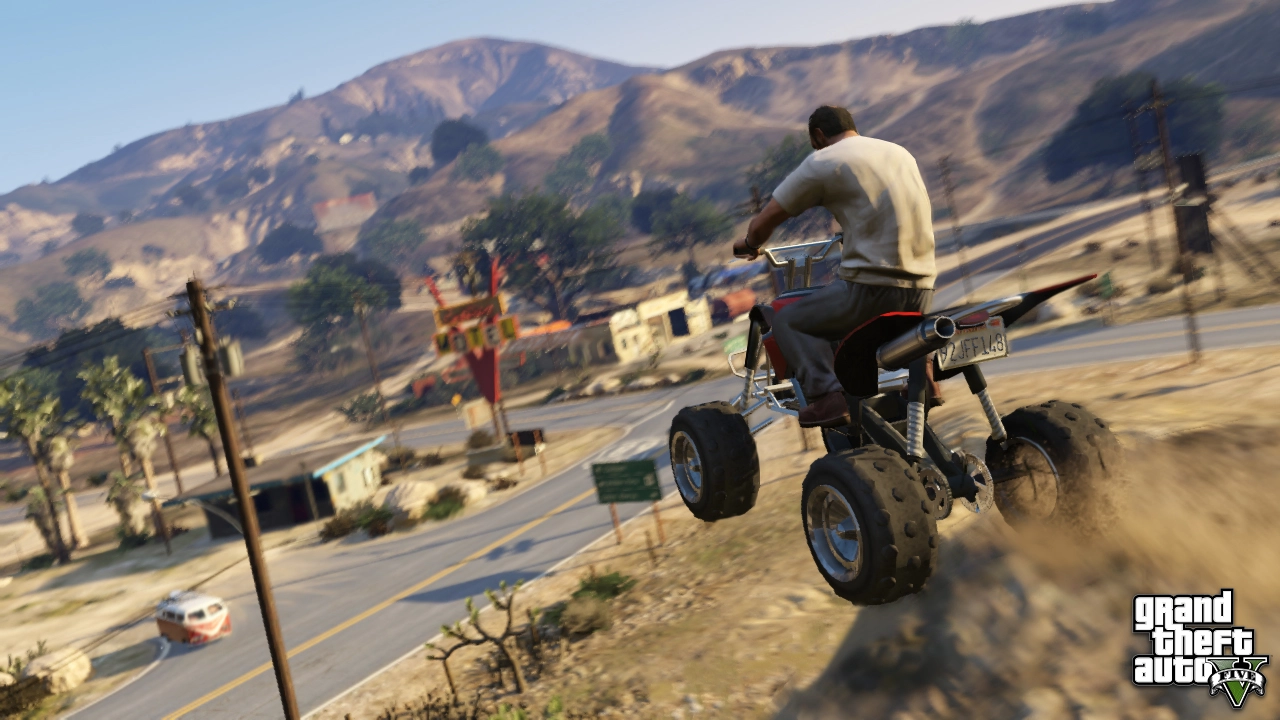 Trevor launches off a hill on a quad