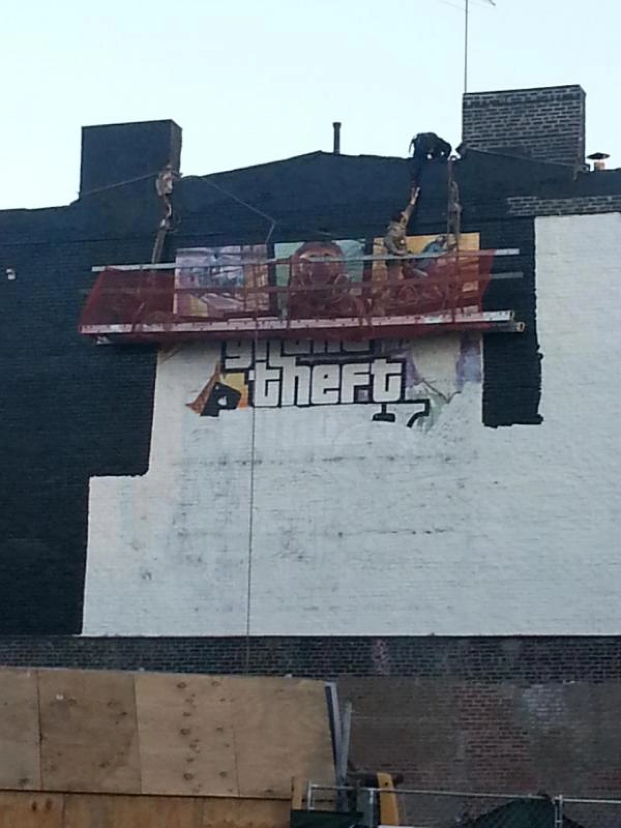 GTA V Cover Art Ad in NYC Being Painted