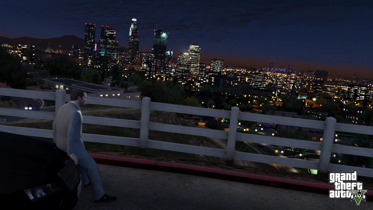 Michael gazes out at the city lights