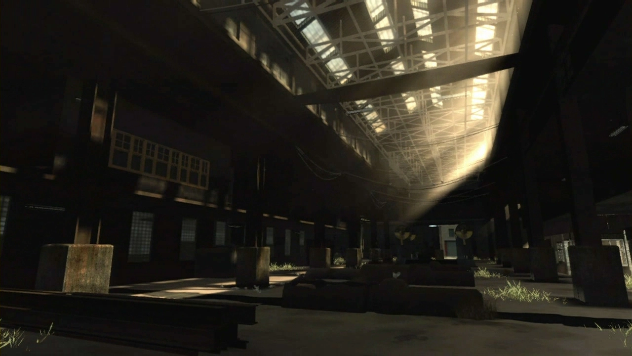 The sunlight brightens a dark warehouse.