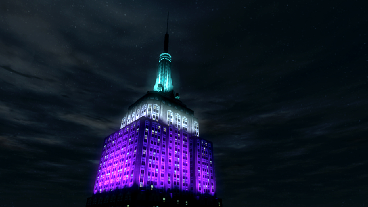 A colourfully lit building at night