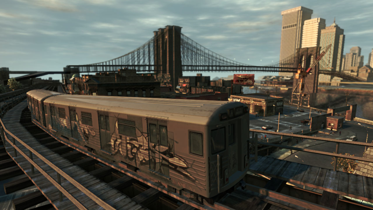 A train heads around the tracks towards the big city.