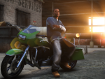 Franklin chillin' with a green motorcycle
