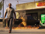 Trevor walking away from a burned Rebel pickup