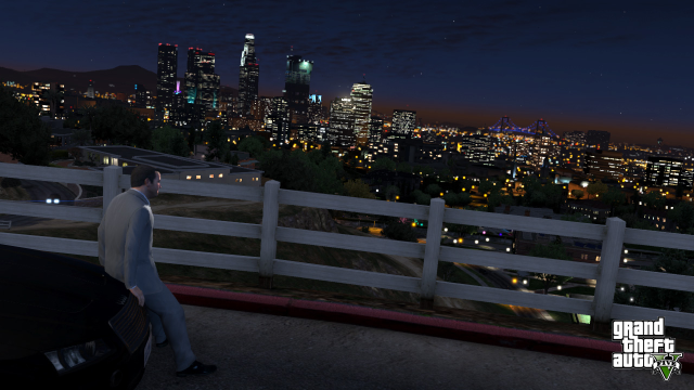 Michael gazes out at the city lights