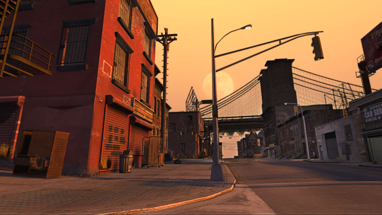 An empty street glows orange at sunset (or sunrise!)